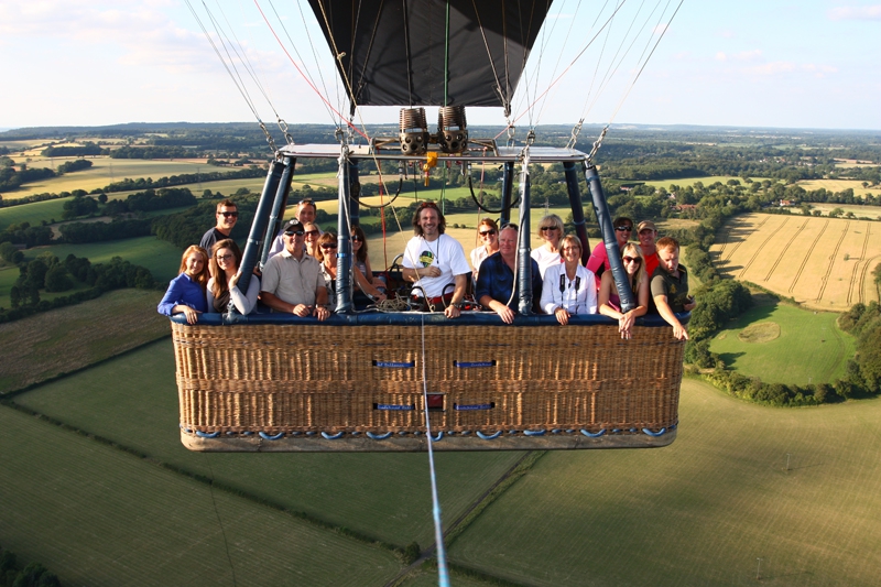 Joy and family and friends in the hot air balloon basket on a lovely July summer evening