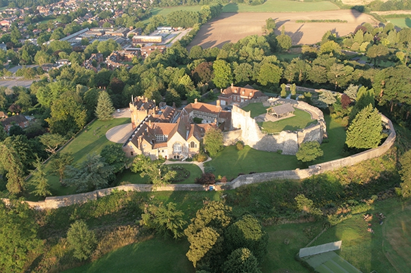 Dawn sunlight bathes Farnham Castle as we take off from Farnham Park in Surrey and get this great aerial view