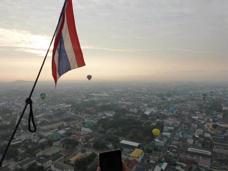 Hot air balloons flying over Chiang Mai in&nbsp;Thailand&nbsp;on an early morning hot air balloon flight. That&rsquo;ll be the Thai flag flying from the balloon basket then!