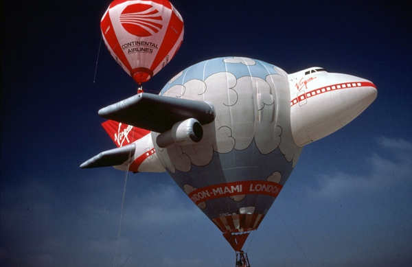 "Continental Flies Virgin!" - Kim Hull jumps on the wing of the Virgin Jumbo Balloon