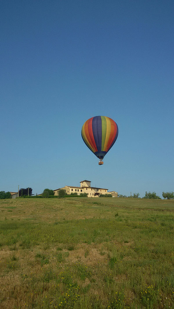 Our "Rainbow" balloon comes in to land on its first flight in Italy near Tavarnelle Val Di Pesa, 20 miles south of Florence.