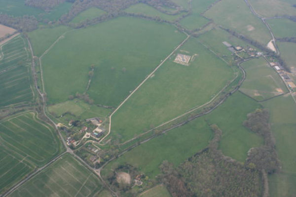 Ballooning over Berkshire and the Roman town of Calleva at Silchester from our balloon showing the amphitheatre at the bottom and the square excavation site towards the top of the picture