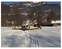 Preparing the balloon on a snow covered football playing field in France