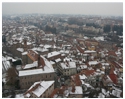 A frosting of snow on the rooftops make for a magical view from the hot air balloon