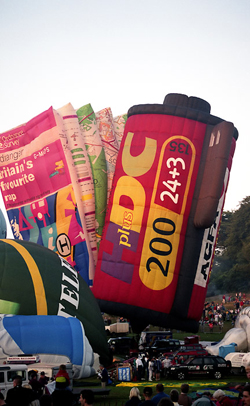 Agfa Film canister and OS Map air balloons inflate alongside