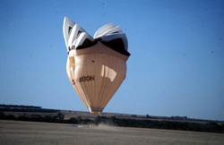 You can see the light of the sun on the right side of the balloon showing the dump being opened.