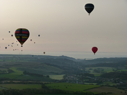 A cavalcade of balloons head out to the Kent coast