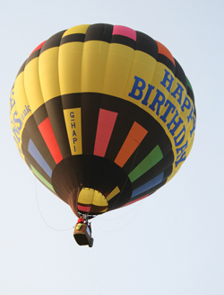 Happy Birthday Balloon flying over English Channel