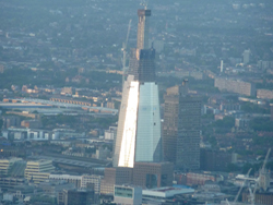 Flying past the Shard over the river Thames, London