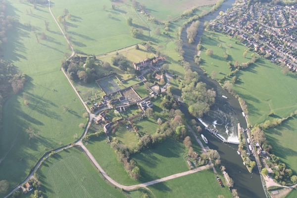 An aerial view of much of the main house and associated cottages and buildings of Mapledurham, a short distance down the River Thames from Hardwick House. This picture also shows the weir and the mill at Mapledurham.