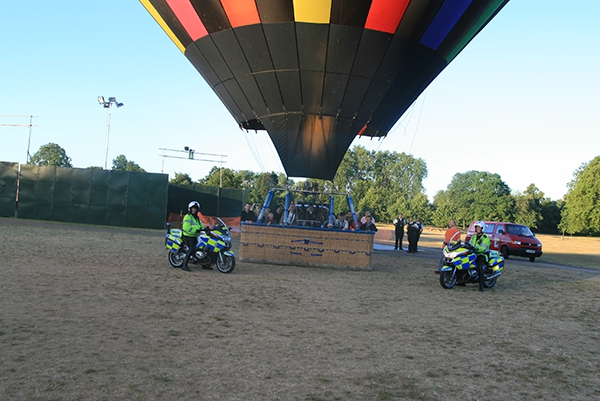 Just before take off two police motorcyclists turned up and having established they weren't booking us for speeding we got them to pose in front of our basket with their colourful bikes.