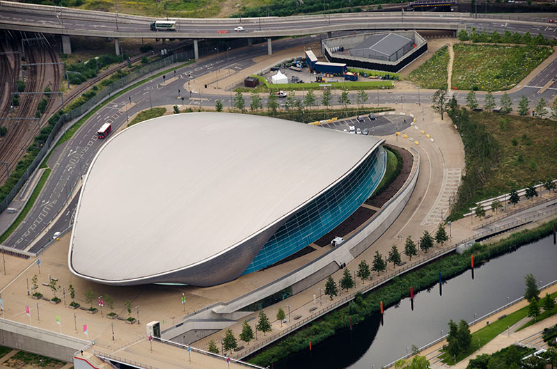 The stunning shapes of the Olympic Aquatic Centre designed by the late Zaha Hadid are thrown up in this aerial view taken on our hot air balloon flight over London by passenger Rosa Amador