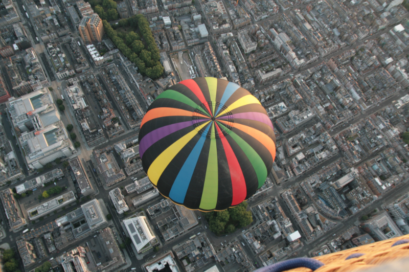 With the upper wind being unusually lighter than the lower winds our second balloon undertakes the lead hot air balloon as we approach London&rsquo;s Oxford Street on our London balloon rides