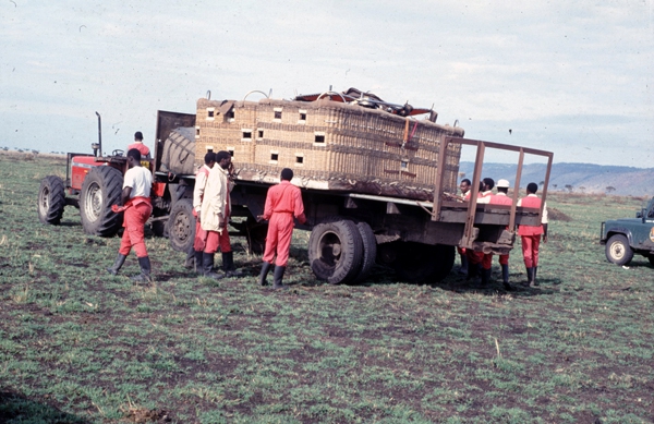 Local Masai crew put the balloons onto tractors and trailers to return them to the camp.
