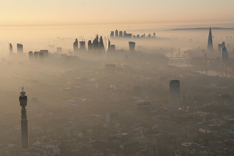 The city of London shrouded in dawn mist on our balloon flight