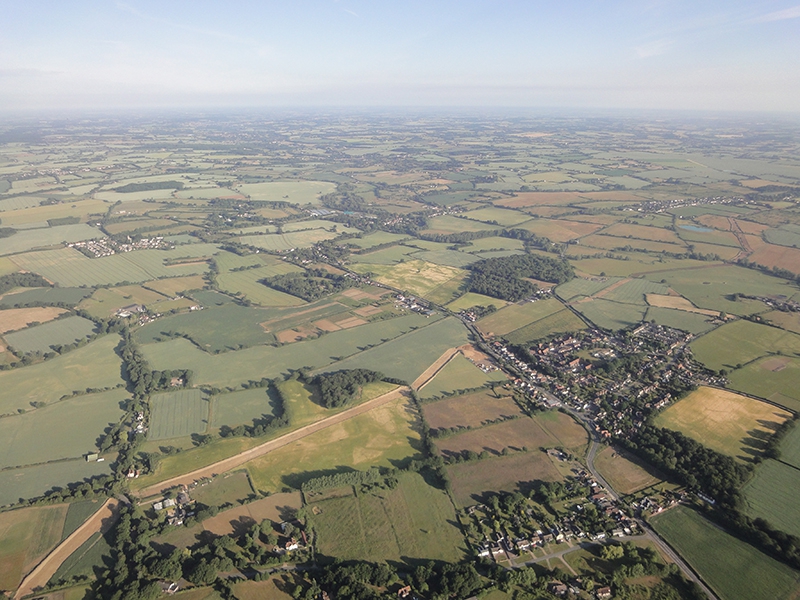 On balloon flights from our take off points near Colchester you may have aerial views of small villages such as Ford Street, Aldham and Wormingford which are all visible in this picture. For some of the flight the balloon will travel at this sort of height to give you a panoramic view of the Essex countryside and when taking off or landing you will travel close to treetop height and perhaps be able to talk to people on the ground.