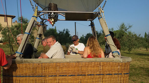 Despite a "Landing by Committee" with four pilots (or should that be egos) in the basket we landed next to a beautiful house surrounded by olive groves.