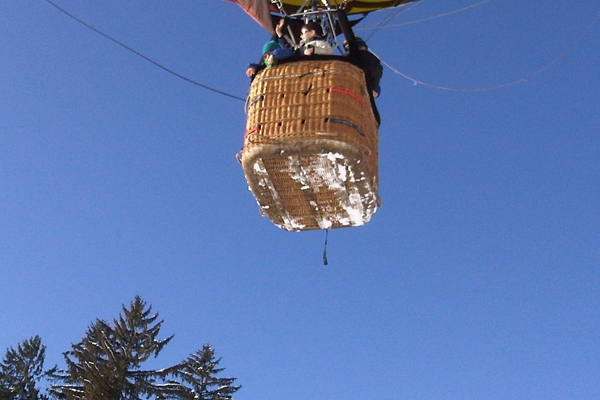 Snow on the bottom of the balloon basket as we take off - Its normally mud when we fly in England.