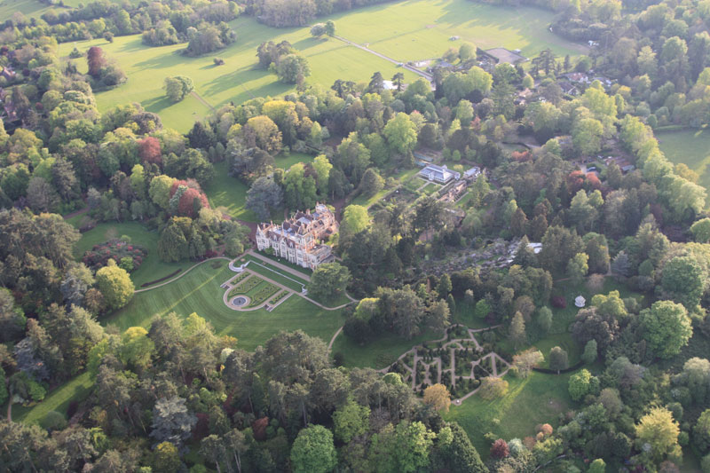 
Here are some great aerial views and pictures of Friar Park, built in 1875 for the eccentric lawyer Sir Frank Crisp is a 120-room Victorian neo-Gothic mansion in Henley-on-Thames. By the 1960&rsquo;s it had fallen into disrepair and was due to be demolished. Enter Beatle George Harrison in 1970 and his imagination, energy and finances restored the house and enlarged its lake. It also has a rockery, large green house and formal gardens which are a fine view on a hot air balloon flight over Henley. Read more about the history of Friar Park at http://en.wikipedia.org/wiki/Friar_Park and the songs that it inspired George to write.