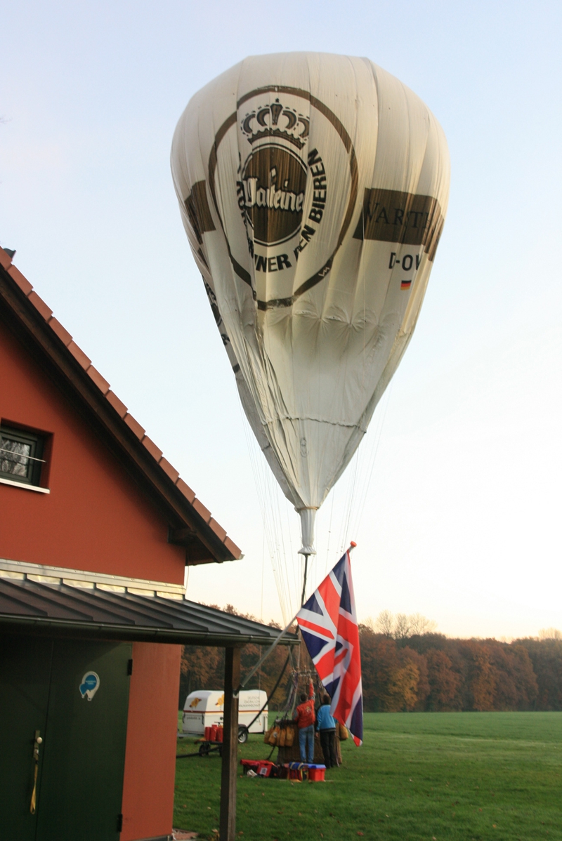The gas balloon is filled with hydrogen from a convenient industrial gas main