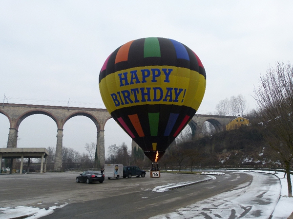 A stop to change passengers in the car park in the centre of Mondovi by the railway viaduct