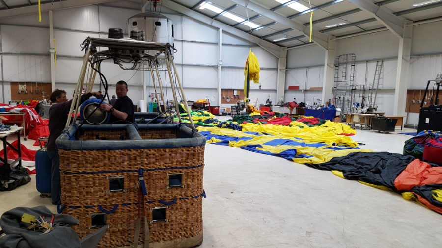 One of our Happy Birthday Balloons is laid out on the factory floor for it&rsquo;s annual certificate of airworthiness inspection