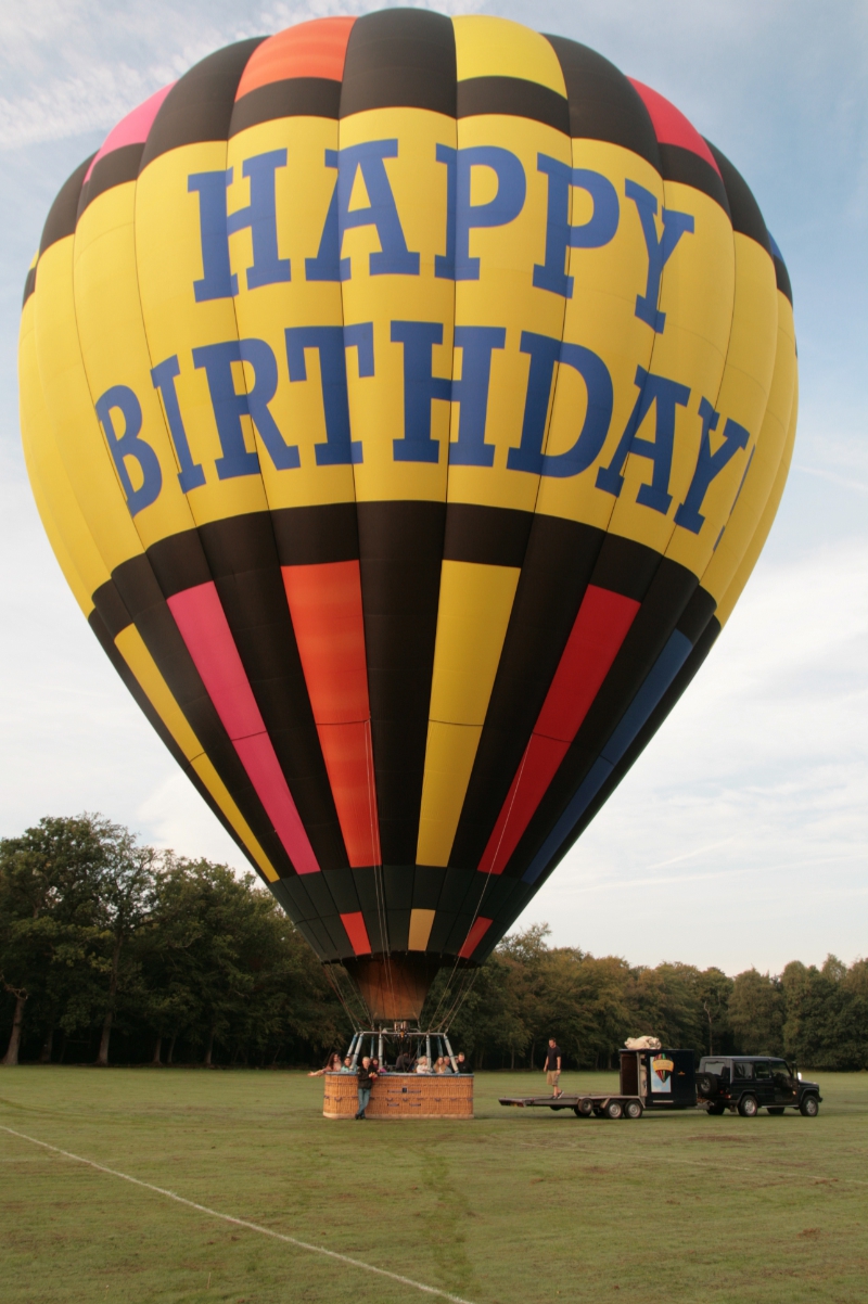 Our Happy Birthday Balloon lands at the end of another exciting balloon ride over Surrey