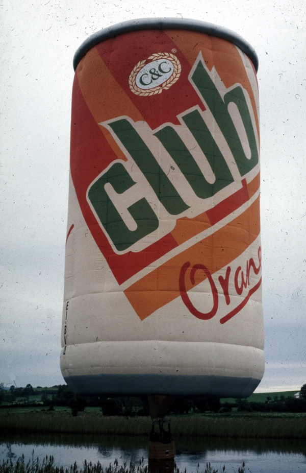 Club Orange "Can" stands about 100 feet tall.