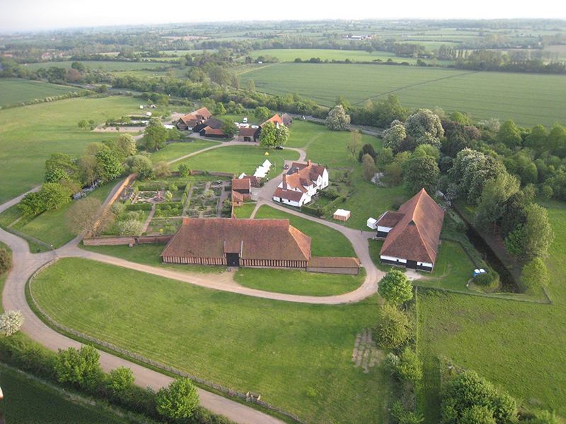 The Knights Templar built these barns at Cressing Temple in Essex in the thirteenth century and these and the walled gardens are clearly visible in this aerial view while ballooning in Essex.