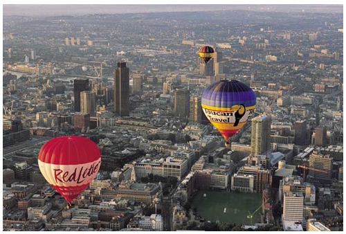 Three hot air balloons over London