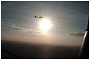 A glider circles around the balloon near Lasham